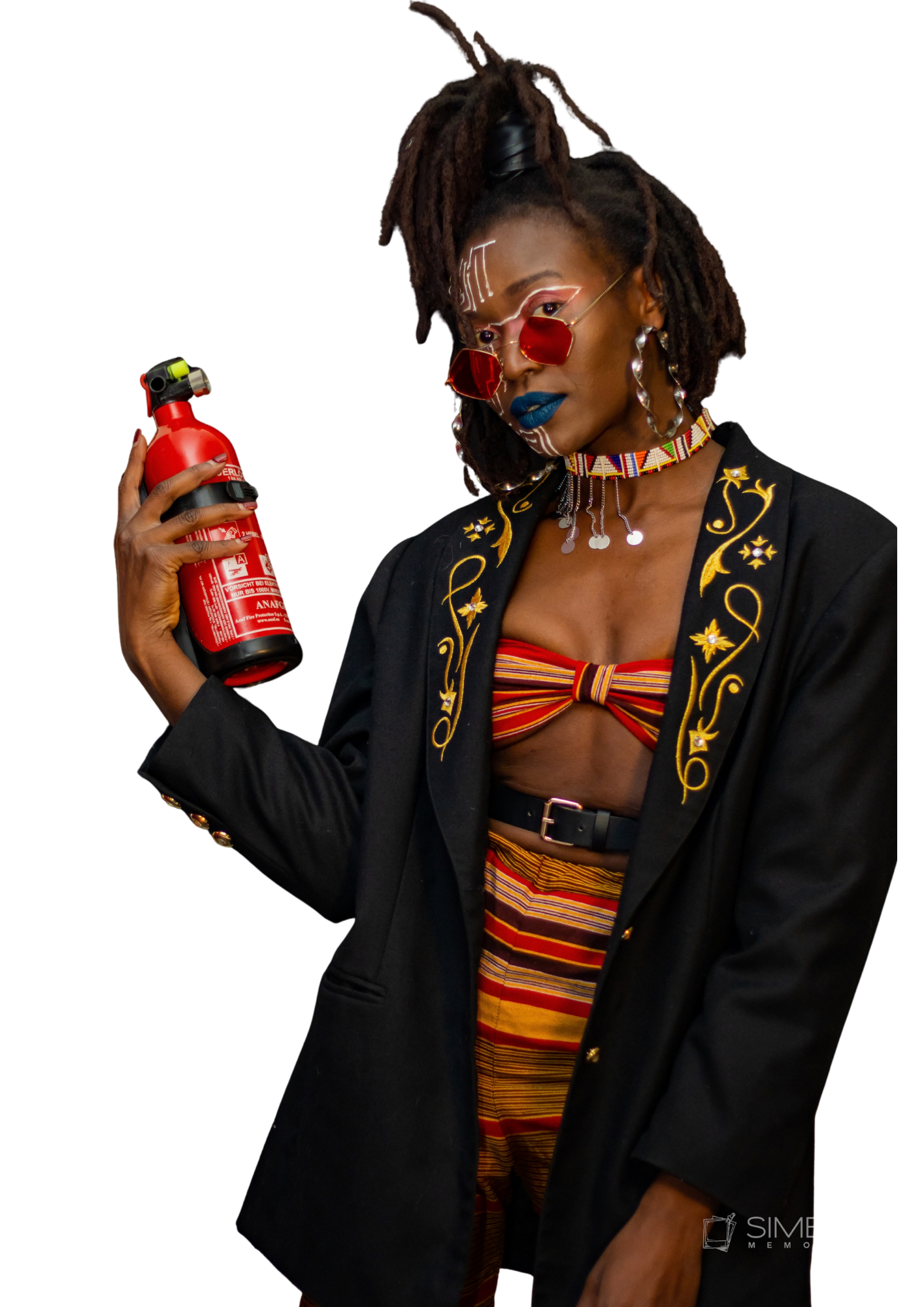 Catu Diosis wearing red sunglasses and face paint, holding a red fire extinguisher.